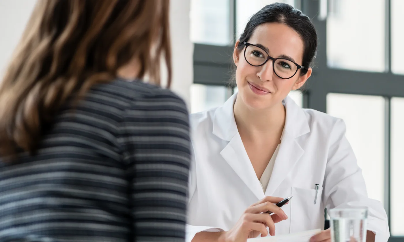 Hospitalist listening to patient