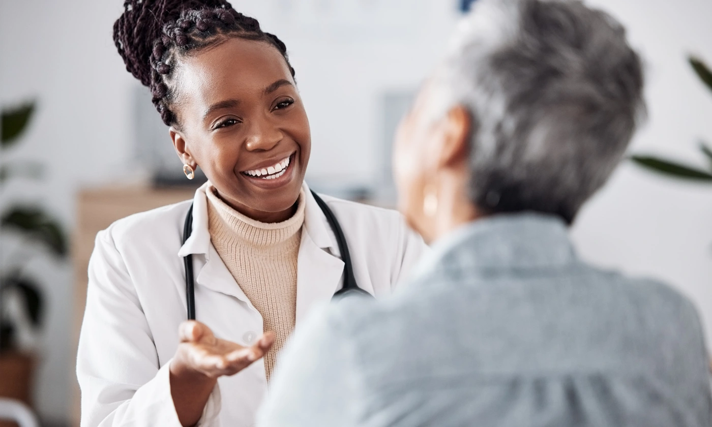 Gynecologic Oncologists speaking with patient