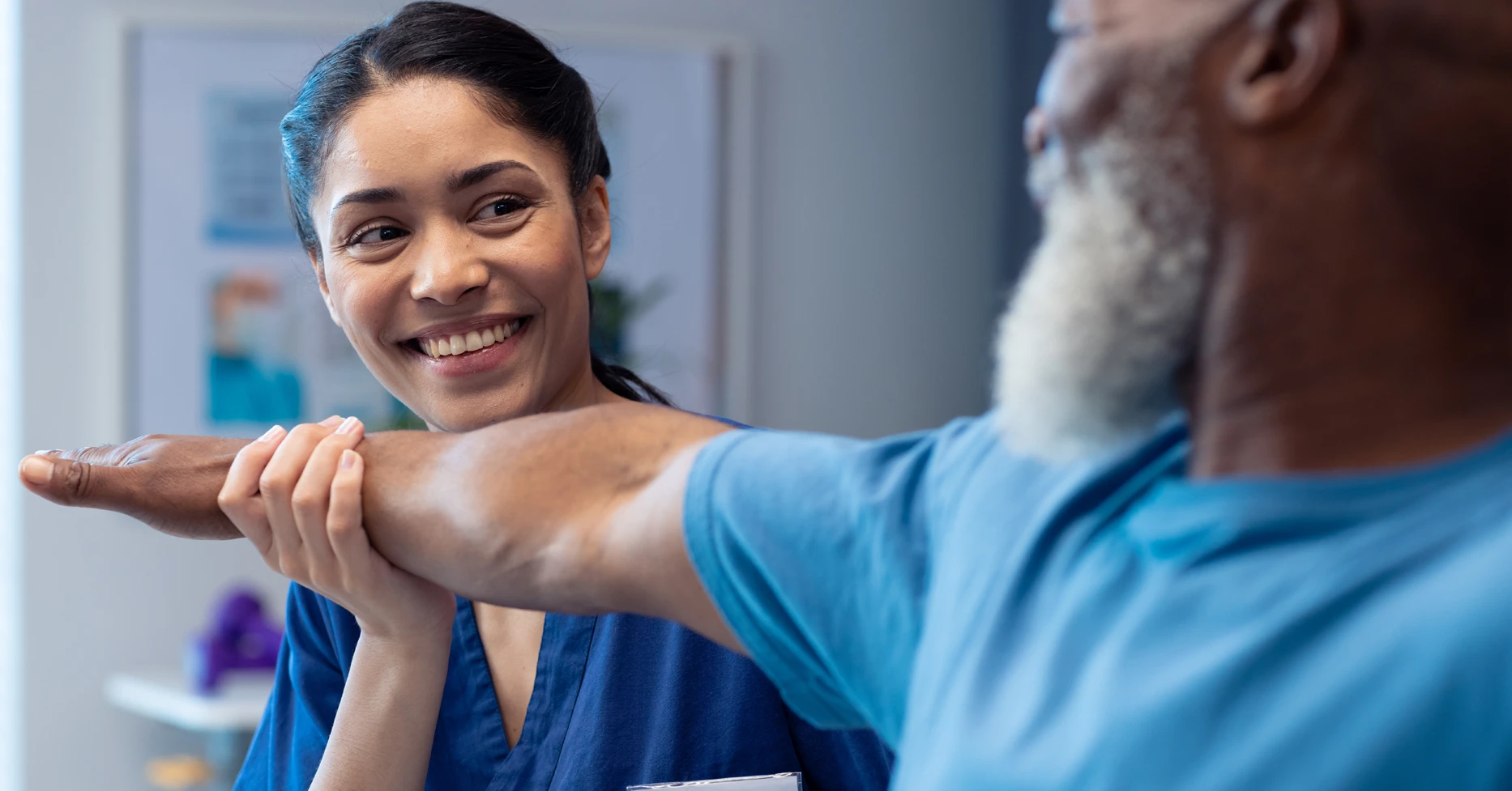 Physical therapist working with patient